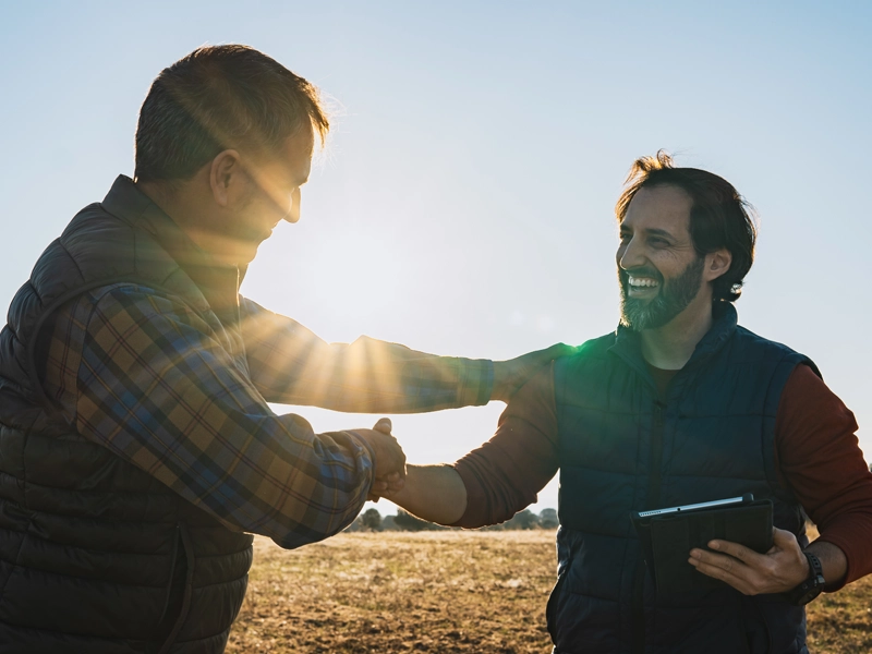 two men shaking hands